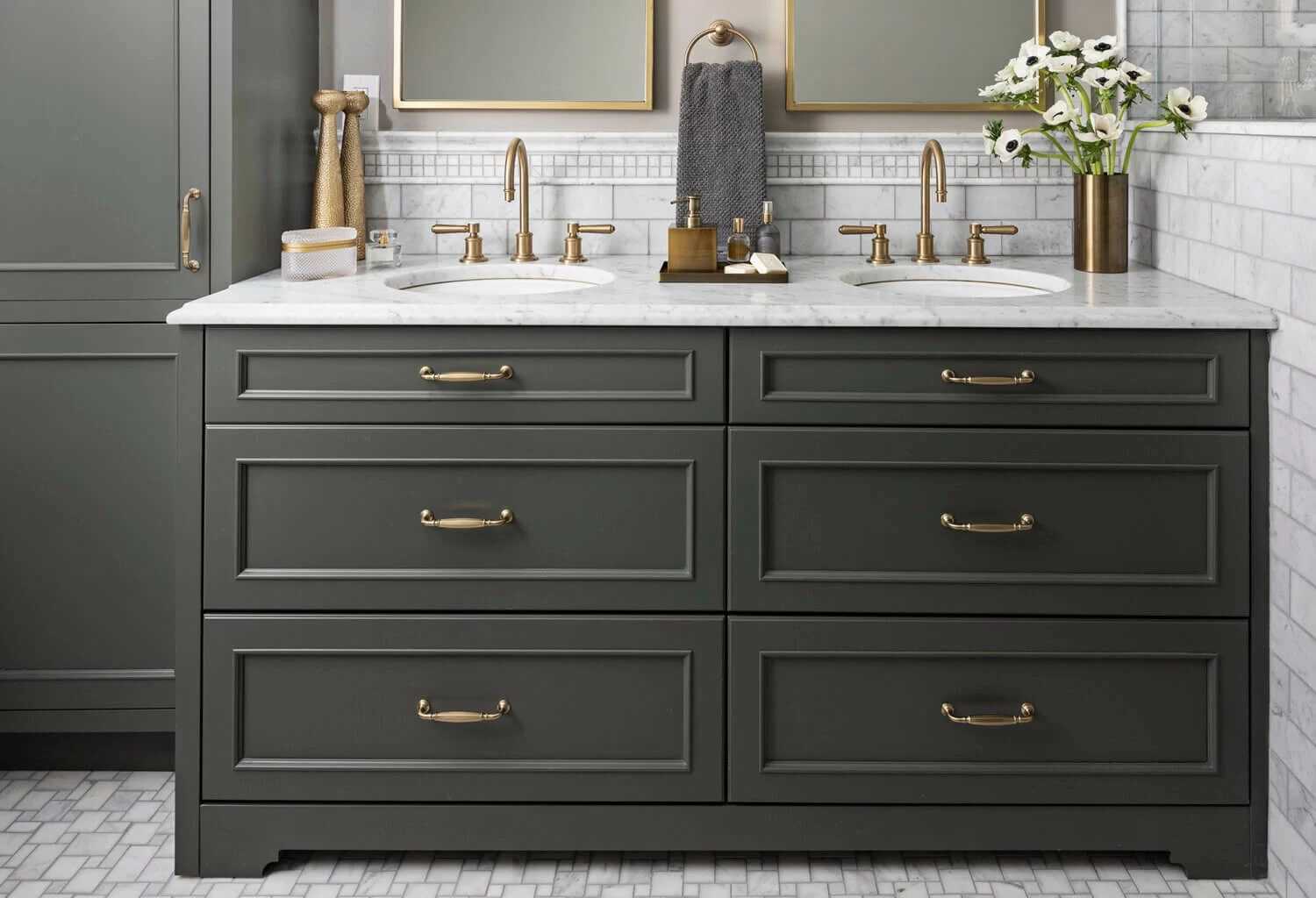 bathroom vanity with green cabinets