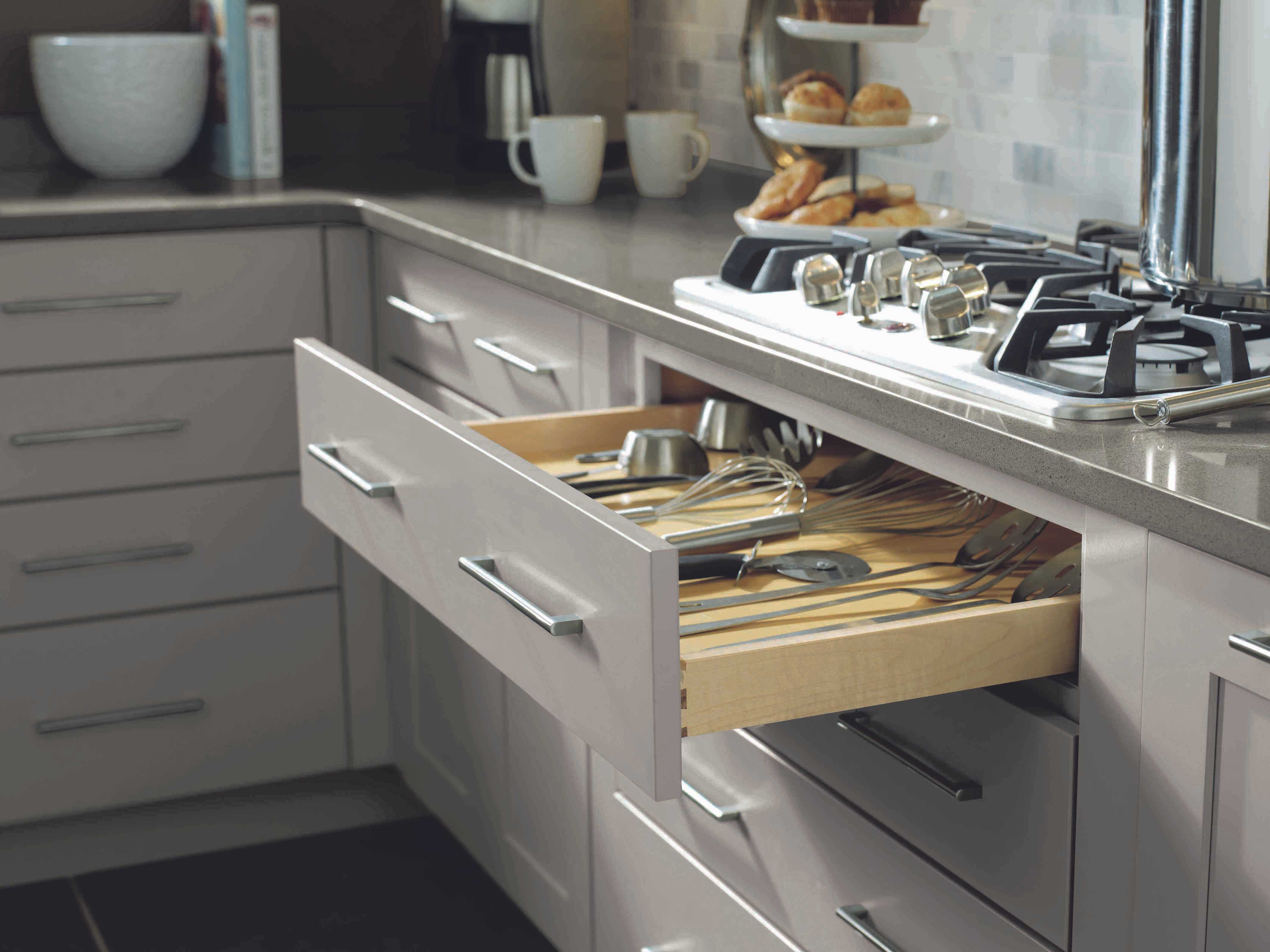 kitchen drawer with utensils open