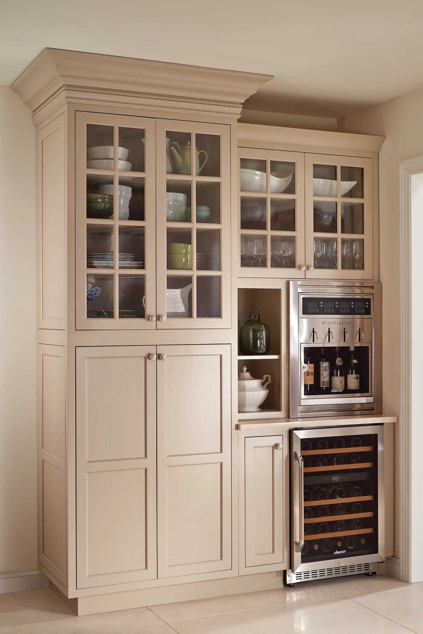 beige wall cabinets with built-in fridge and wine cooler